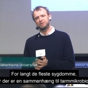 Et billede af Dennis Sandris Nielsen fra Københavns Universitet, der holder foredrag om betydningen af tarmsundhed hos grise